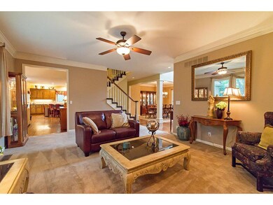 Great room w/plantation shutters, gas fireplace an