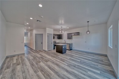 Spacious living room with a clear view of the kitc