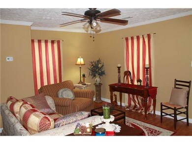 spacious livingroom with wood laminate flooring