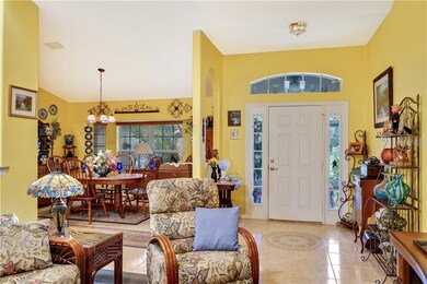 Beautiful entry with side lights, transom and tile