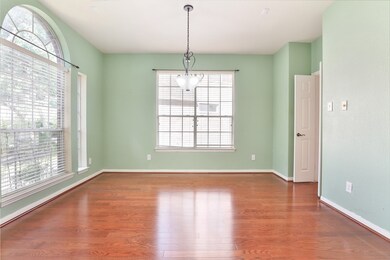 This home welcomes you with a spacious foyer that leads to both a formal dining room and a formal living room. This area could also be used as a home office or a play area.
