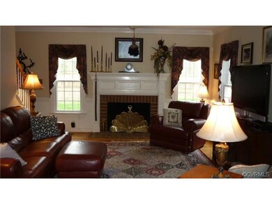 Second view of Family Room w/ Gas fireplace and Cu