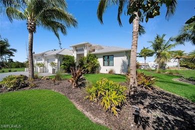 View of front of home featuring stucco siding, a f