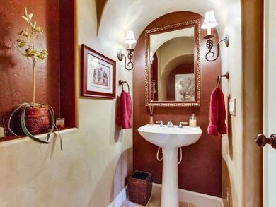 Artistic detailing the powder room - an inviting s