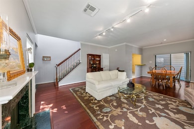 Bright and open living room with plenty of natural light and a comfortable, welcoming layout.