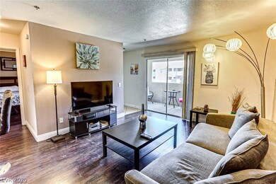 Enter into Living Room with newer laminate floorin