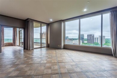 Spacious Living and Dining Rooms lined with walls 