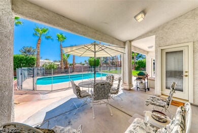 Enjoy this sparkling pool, large covered patio wit