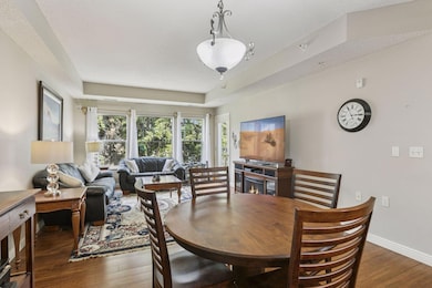 Spacious main living space with high tray ceiling