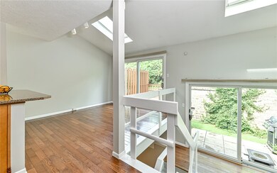 Gleaming wood flooring in kitchen and dining room