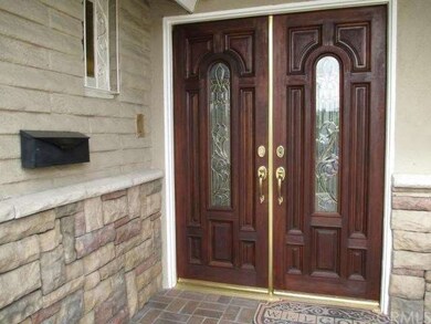 Newly Stained Doors complete this homes curb appea