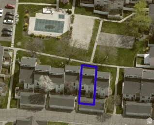 Aerial photo showing proximity to pool, playground and basketball court