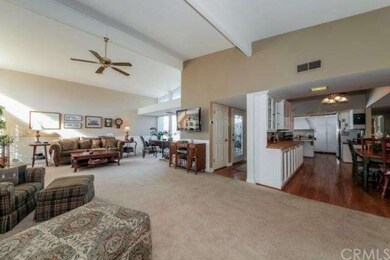 Living room open to dining area and kitchen