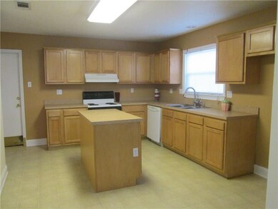 Large Kitchen with lots of Cabinets and Island