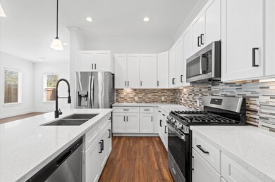 Stainless steel appliances and soft-close drawers