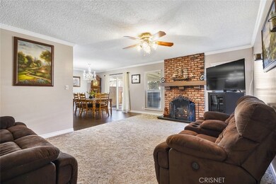 Living room looking to dinning area & slider to back yard