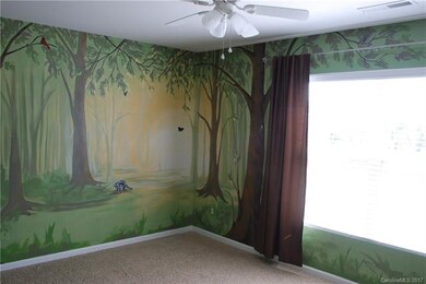 Bedroom w/ hand painted walls