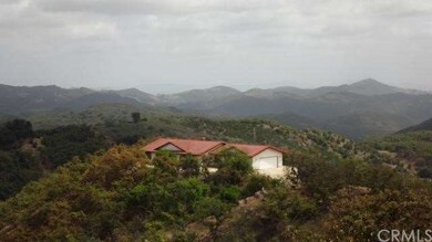 Another view of the home sitting at the top elevat