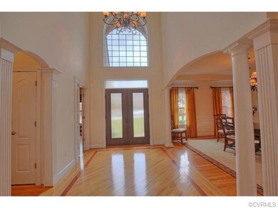 Beautiful wood floors and custom door for formal e