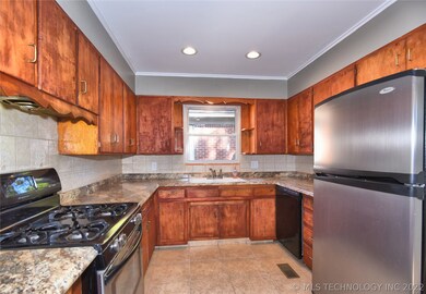Gas stove and frig stays.  Cabinets are spacious.