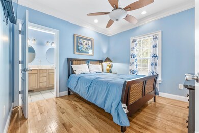 Bedroom with light hardwood / wood-style floors, c