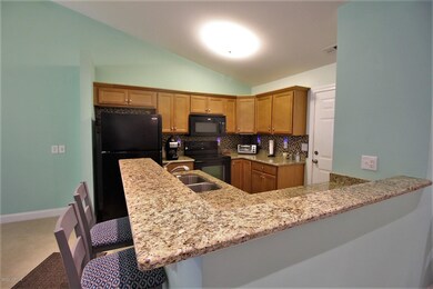 Open kitchen with breakfast bar