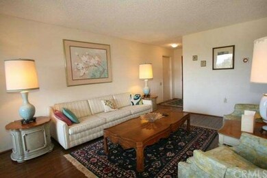 Nice size living room with hardwood floors and gre