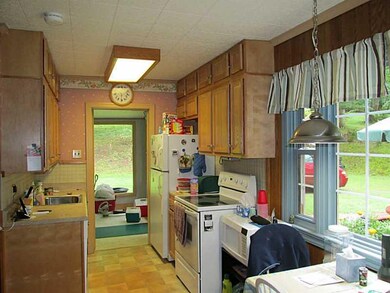 Kitchen. Easy to get to everything! Entry is in th