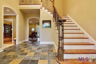 African Slate floors with  custom staircase design