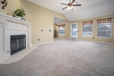 Unfurnished living room featuring light carpet and