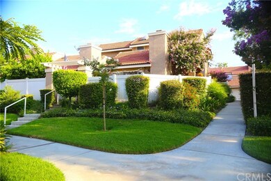 Front view of end condo unit.
Front gate, to  entr