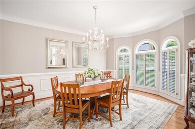 Dining area with an inviting chandelier, a wealth 
