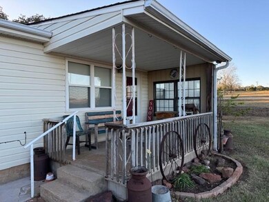 Property entrance featuring a porch