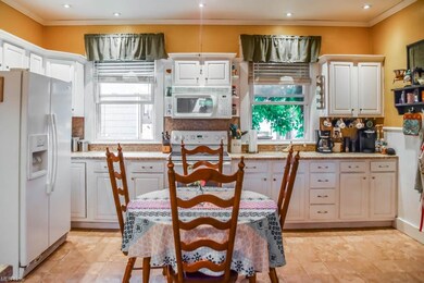 Large, eat-in kitchen - fully applianced.