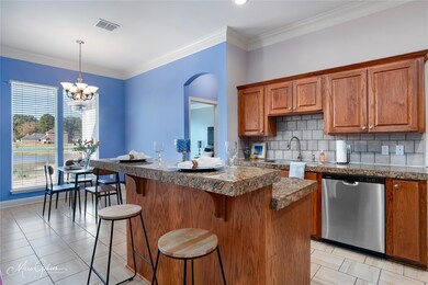 Kitchen and dining with stainless steel appliances