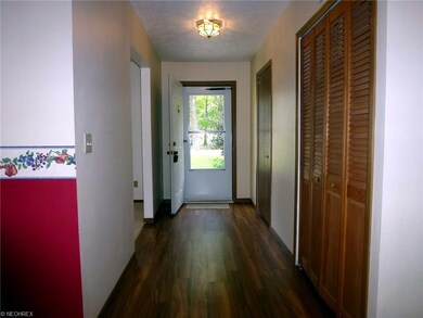View from Dining Room of entry foyer with new lami