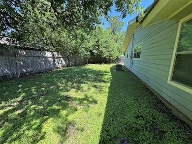 View of yard featuring cooling unit
