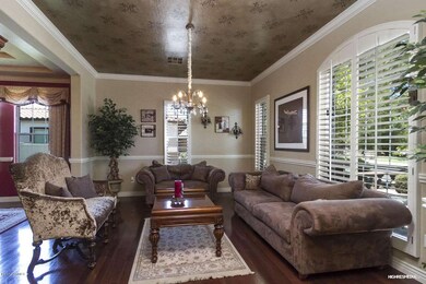 Formal Living Room with wood flooring