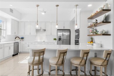 583 Avellino Isles Cir unit 202, Naples, FL 34119 - photo 2