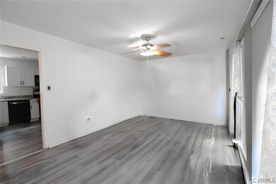 Unfurnished room featuring wood-type flooring and