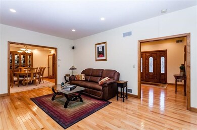 The living room adjoins the dining room for easy e