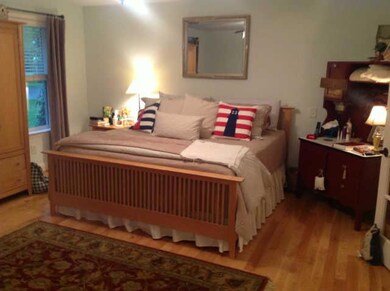 VERY SPACIOUS OWNERS SUITE WITH HARDWOOD FLOORING