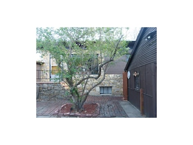 Side of house and garage