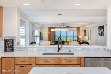 Kitchen overlooks dining and living area