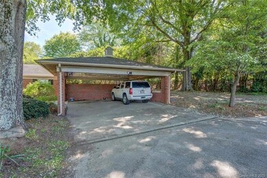 The large carport would be a great place to hang out on a nice summer evening when it's raining.
