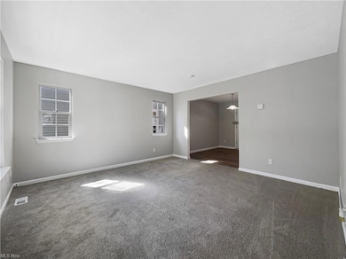 View of carpeted spare room