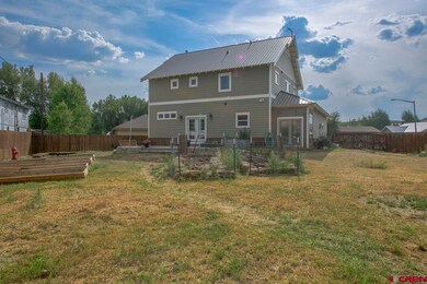 8 raised bed gardens, fenced, chicken coop, shed, 