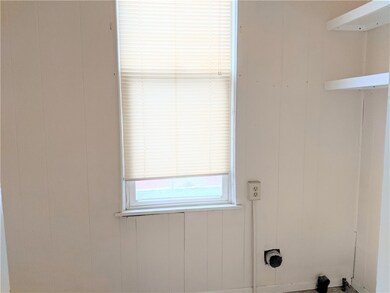 First floor laundry room off kitchen