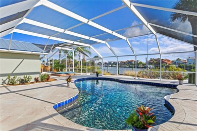 Beautiful Travertine pool decking surrounds the la
