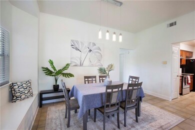 Dining room featuring light tile patterned floori